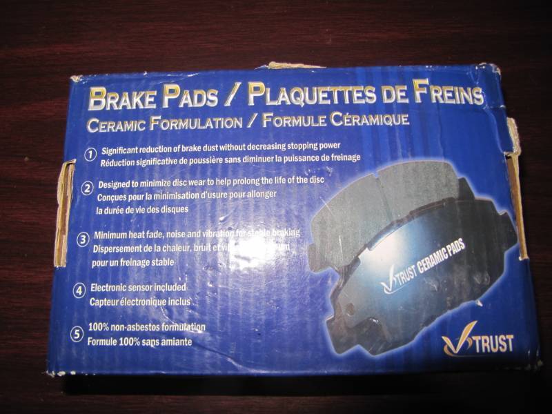 lot 1979 image: Set of 4 Ceramic Brake Pads for 08-12 Town & Country 08-10 Dodge Caravan Journey-New IN BOX