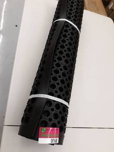 lot 68 image: black rubber mat with holes