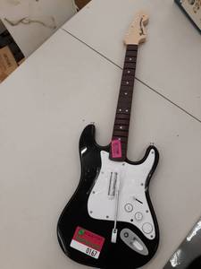 lot 167 image: Rock Band 4 Wireless Fender Stratocaster Guitar Controller for PlayStation 4 - Black