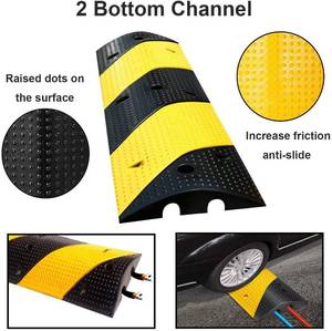 lot 1065 image: 2PC Rubber Traffic Speed Bumps w 2 Channel Heavy Duty Modular Driveway Speed Bump Black Yellow