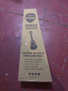 lot 7288 image: Official Kala Learn to Play Ukulele Soprano Starter Kit, Satin Mahogany