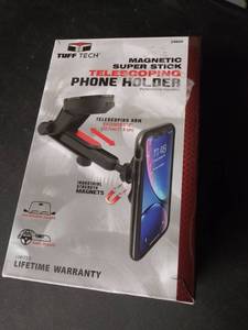 lot 812 image: Stuff Tech magnetic super stick telescoping phone holder