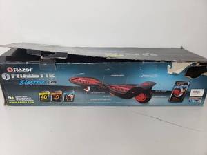 lot 50115 image: Razor RipStik Electric Caster Board with Power Core Technology and Wireless Remote, Red