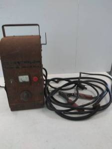 lot 9876 image: Rusty Ole  Battery Charger- Mancave Display or Use