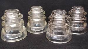 lot 9977 image: Lot of 4 Clear Insulators  Whitall Tatum No. 1 & Hemingway - 45