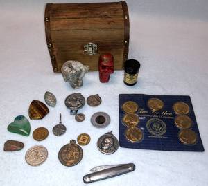 lot 10024 image: Treasure Hunt  Small Wood Chest With Coins, Coin Pendants, Gold Nuggets, Skull Sculptures & More