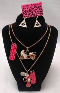 lot 10028 image: 2 New Betsey Johnson Necklaces (Gun & Motorcycle) & Earrings