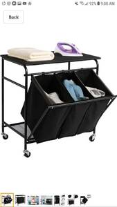 lot 49704 image: HollyHOME Laundry Sorter Cart with Unopenable Ironing Board with Side Pull 3-Bag Heavy-Duty Laundry Hamper and 4 Wheels Black