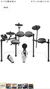 lot 49719 image: Alesis Drums Nitro Mesh Kit  Eight Piece All Mesh Electronic Drum Kit With Super Solid Aluminum Rack, 385 Sounds, 60 Play Along Tracks, Connection Cables, Drum Sticks & Drum Key included