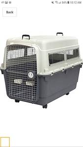 lot 49970 image: SportPet Designs Plastic Kennels Rolling Plastic Wire Door Travel Dog Crate