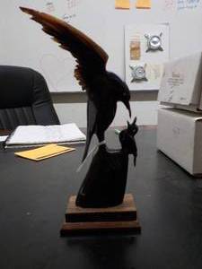 lot 6212 image: Horn mamma bird feeding baby made from buffalo horn 8 tall