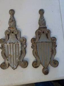 lot 6245 image: 2 cast iron decorative pieces 9 tall x 3 wide