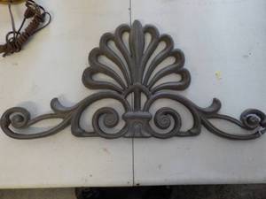 lot 6248 image: cast iron decorative piece 21 wide x 10 tall