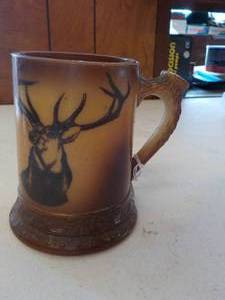 lot 6299 image: Coffie mug with deere pic on it