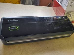 lot 1791 image: Food saver plugged in work
