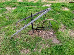 lot 120 image: Antique push garden plow
