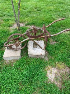 lot 133 image: Antique wheel barrel frame with extra wheel