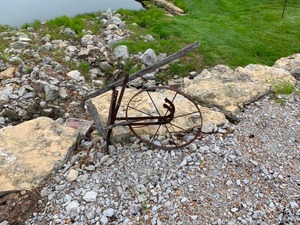 lot 138 image: Antique push garden plow