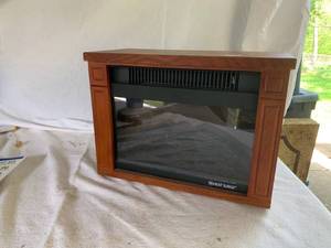 lot 90 image: Heat Surge Electric Heater