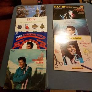 lot 1449 image: 7 Elvis vinyl records