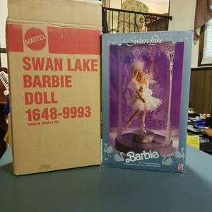 lot 1457 image: Swan Lake Barbie in her own exquisitely themed case, Barbie pirouettes on a music box to the Melody of Swan Lake