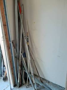 lot 1557 image: All Remaining in Corner of Garage