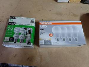 lot 1592 image: 2 Boxes 60W Equivalent Light Bulbs