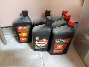 lot 1610 image: Transmission Fluid and Power Steering Fluid