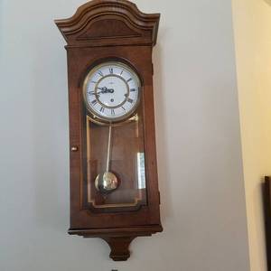 lot 1702 image: Howard Miller wall clock
