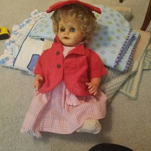 lot 1736 image: vintage doll with red jacket and hat