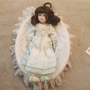 lot 1739 image: doll with basket