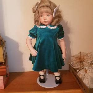 lot 1743 image: doll on stand with hair comb