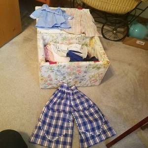 lot 1842 image: box of assorted doll clothes