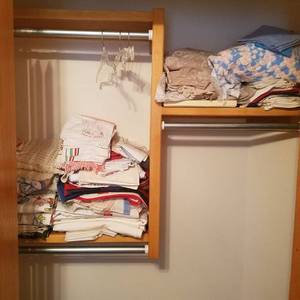 lot 1869 image: All Linen on two shelves in closet