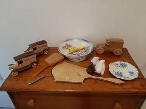 lot 1918 image: 2 Montgomery Ward Truck Banks and All on Top of Chest