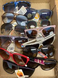 lot 24 image: lot of sunglasses