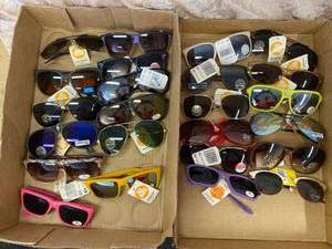 lot 30 image: 24 pairs of sunglasses