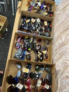 lot 31 image: 48 pairs of sunglasses