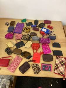 lot 1124 image: 30 small wallets, card holders, coin purses, kids purses
