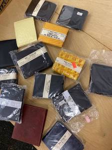 lot 1127 image: lot of 12 wallets