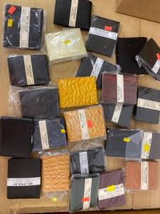 lot 1132 image: over 20 folding wallets