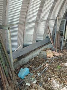lot 205 image: firewood rack, approximately 7 ft long