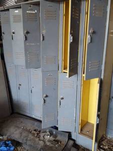 lot 209 image: (4) 8 door locker units, no keys  unknown combinations. the other two units are directly behind