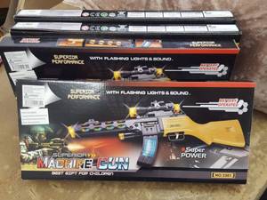lot 1153 image: 4 toy machine guns