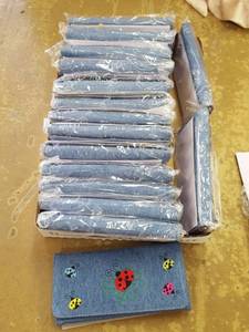 lot 1172 image: 16 denim wallets. Designs may vary