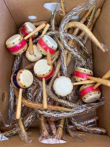 lot 1614 image: lot of wooden snakes & noise makers