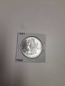 lot 130 image: 1887 Morgan Silver Dollar