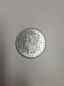 lot 143 image: 1887 Morgan Silver Dollar