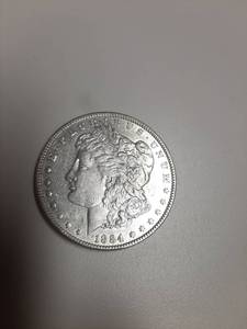 lot 181 image: 1884 Morgan Silver Dollar