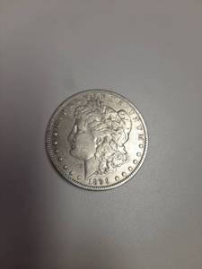 lot 193 image: 1899-O Morgan Silver Dollar